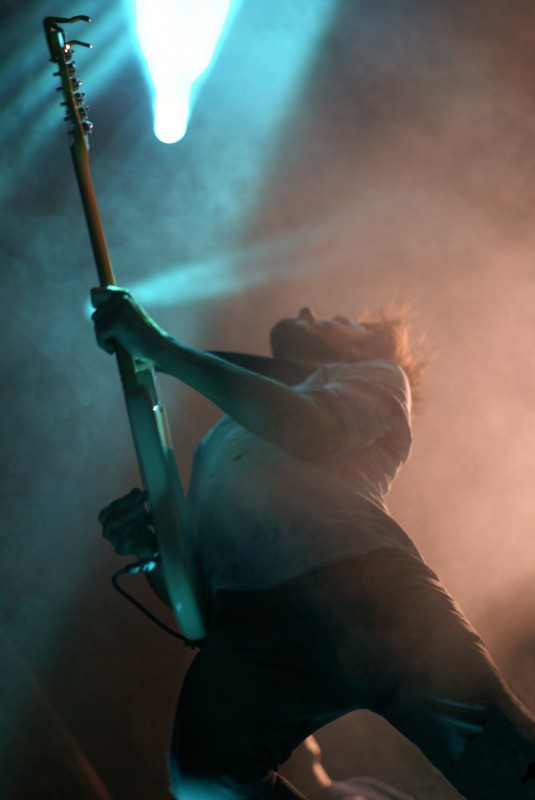 Friendly Fires gig photography Man playing a guitar