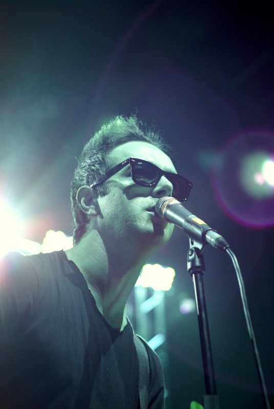 Glasvegas gig photography Man singing into a microphone