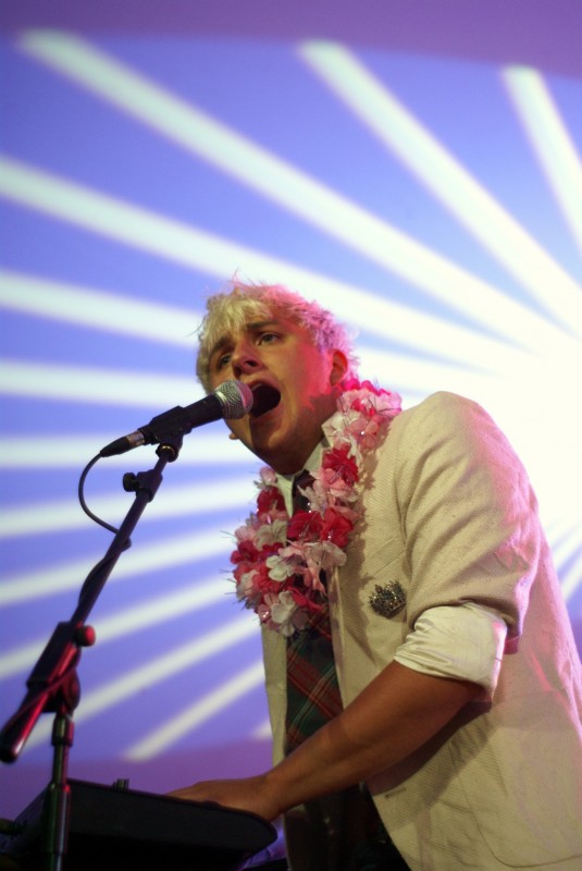 Mystery jets at Beach Break Live Man singing into a microphone