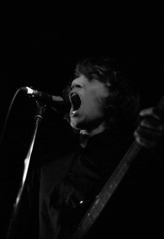 The Haunts gig photographer Man shouts into a microphone