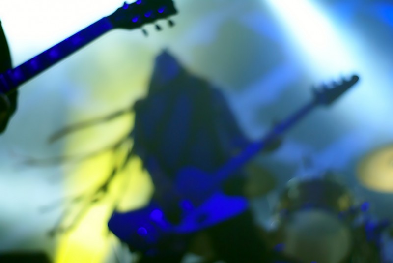 The Levellers gig photographer Guitarist dancing
