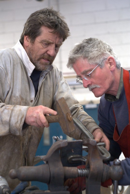 Hot and cold metal art event at Yorkshire Sculpture Park Two men hammering metal at Yorkshire Sculpture Park